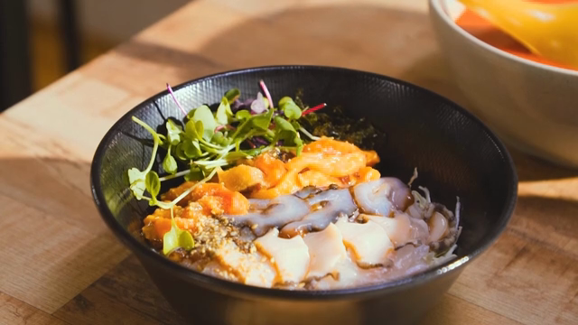 Fresh vegetables and seafood in a bowl