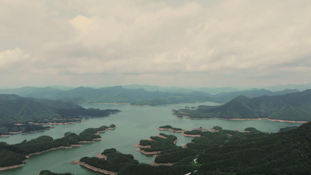 Vast lake surrounded by lush mountains