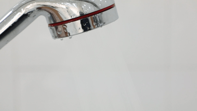 Water flowing from a showerhead