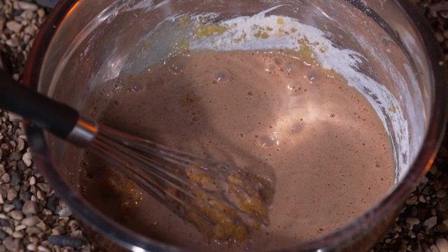 Mixing chocolate batter in a bowl
