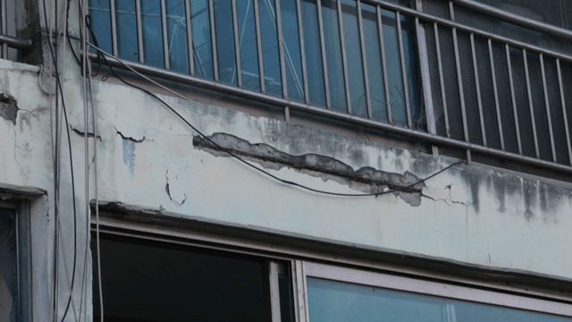 Aged building with visible cracks
