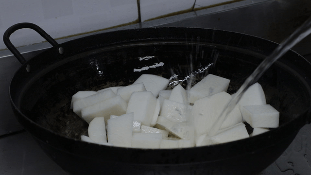 Water poured over sliced radish