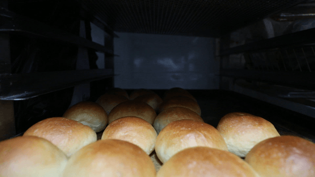 Freshly baked bread on a tray