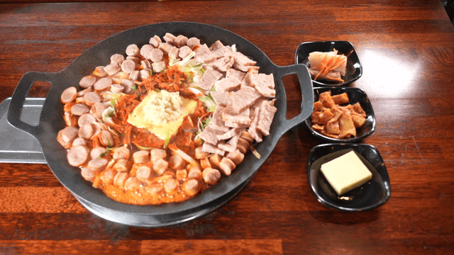 Budaejjigae served with side dishes