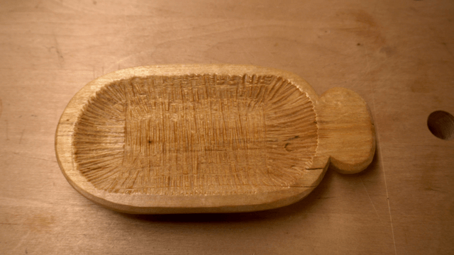 Wooden dish on a wooden table