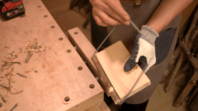 Wooden craft piece with metal handle