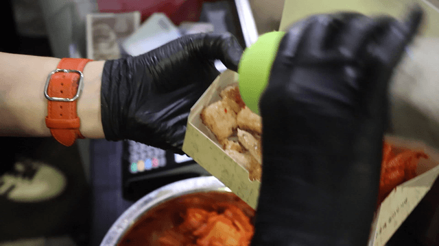 Pork belly lunch boxes being packed