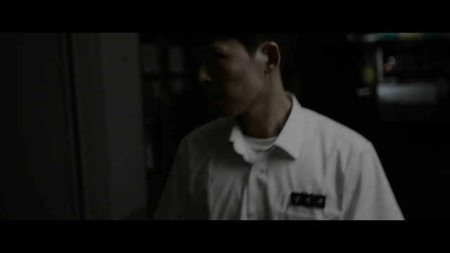 Angry student walking out of dark alley
