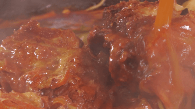 Broth poured into outer leaves pork back-bone stew