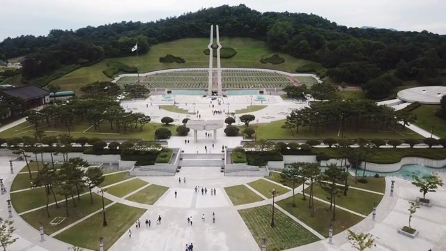 A large memorial park with a monument