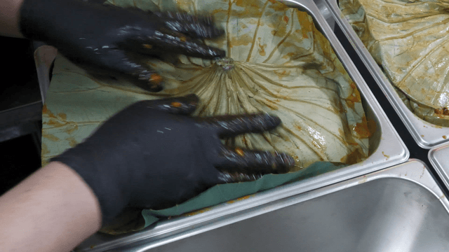 Seasoned stir-fried chicken wrapped in a lotus leaf