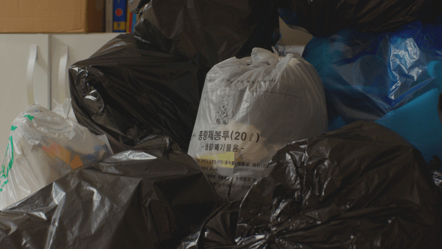 Various piled-up garbage bags