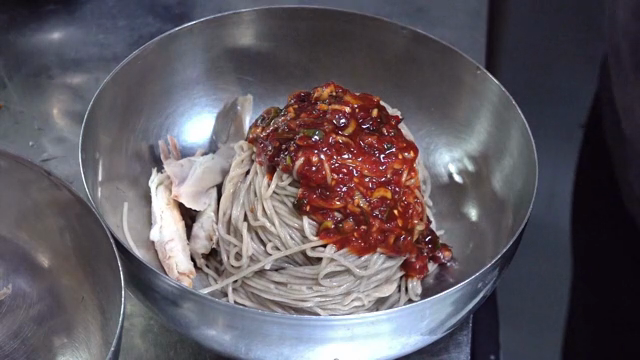 Korean noodles with chicken and spicy sauce