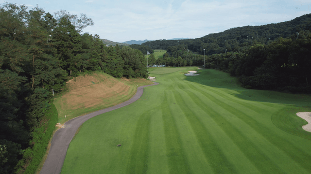 Scenic golf course surrounded by trees
