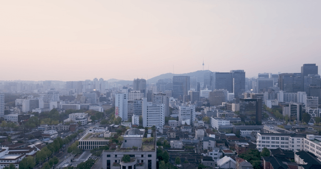 A sprawling cityscape at dawn