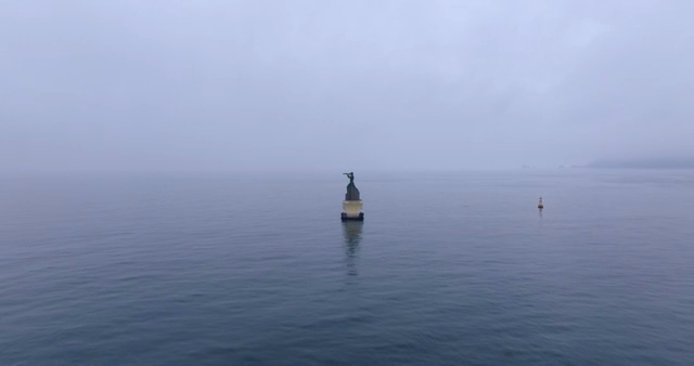 A statue in the middle of the sea