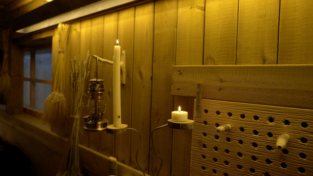 Cozy wooden workshop interior with candlelight