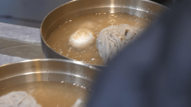 Cold broth served over buckwheat noodles