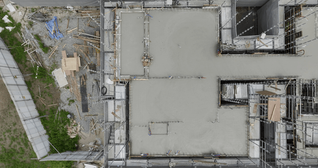 Construction site with scaffolding and materials