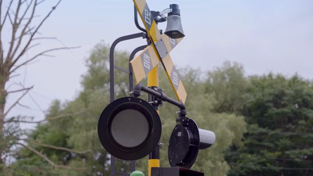 Railroad crossing signal with red light