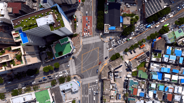 A busy city intersection with traffic