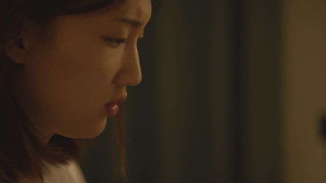 Profile of a woman deep in thought