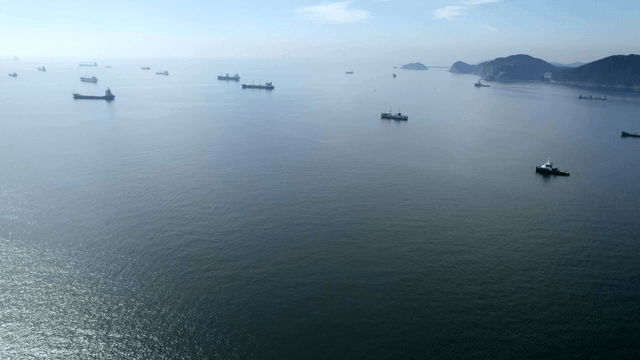Ships scattered across a calm sea