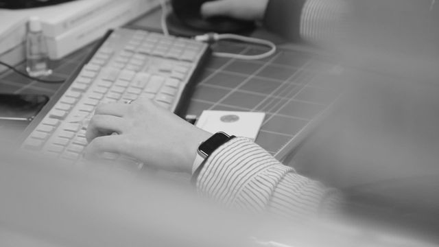 Person working on a computer in an office