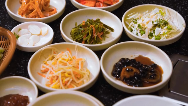 Various Korean side dishes on a table