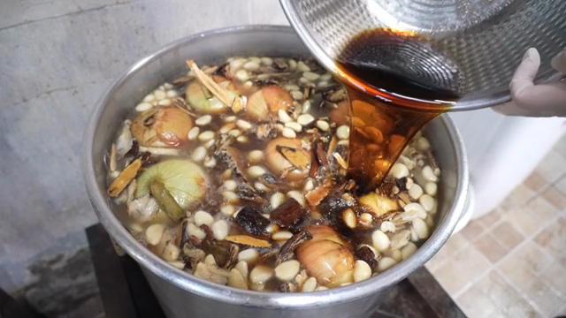 Herbal ingredients boiling in a pot