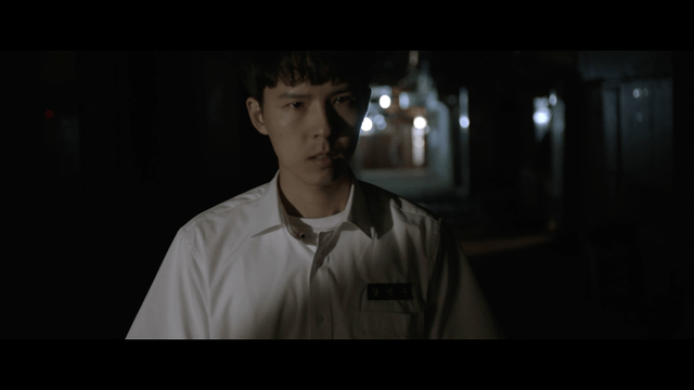 Angry student walking out of dark alley