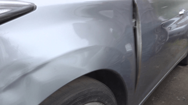 Damaged car with noticeable dents