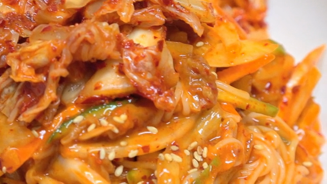 Spicy noodles with vegetables and kimchi