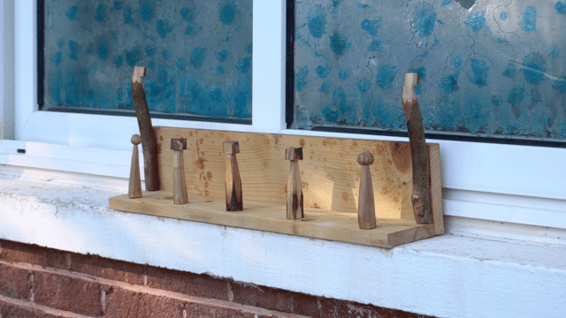 Wooden stand on a windowsill