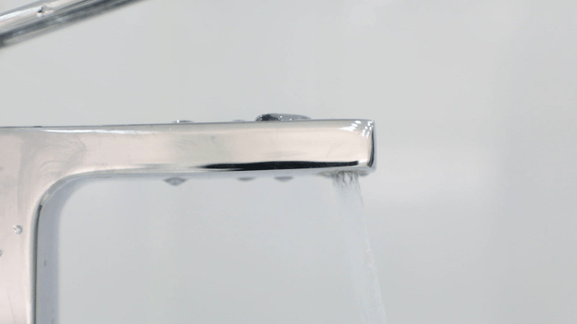 Water flowing from a modern faucet