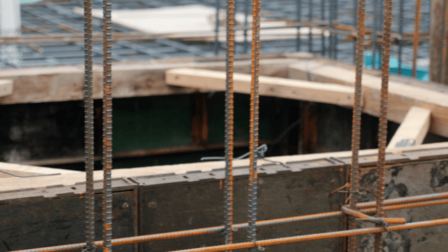 Construction site with rebar and wood