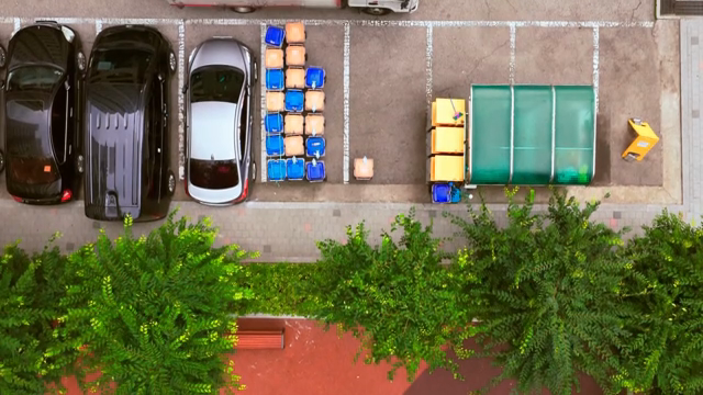 Aerial view of a parking lot and trees