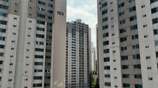 Tall apartment buildings with greenery