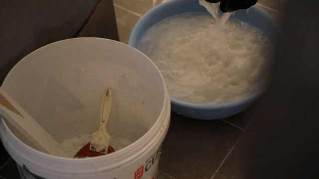 Plastering tools contained in a bucket