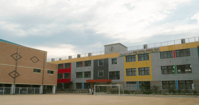 School building with a playground