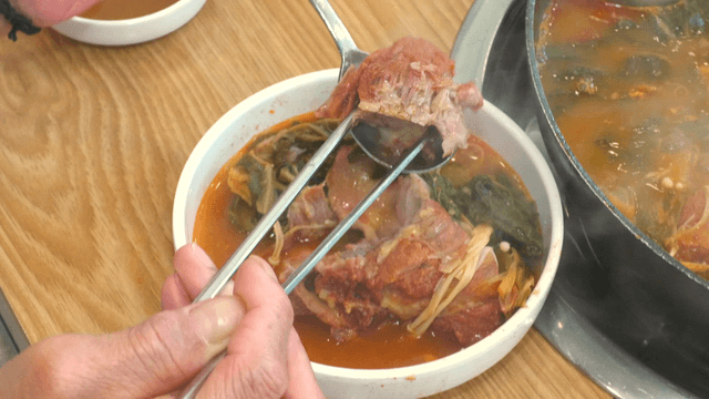 Spoon topped with boneless pork back-bone meat