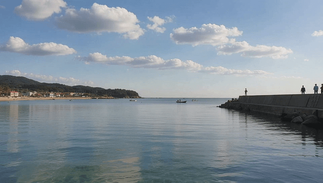 Quiet seaside with boat and pier
