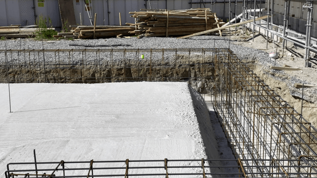 Construction site with rebar and gravel