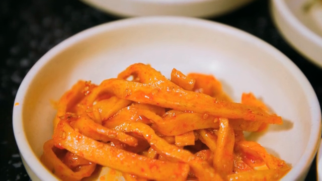 Spicy stir-fried fish cake in a bowl