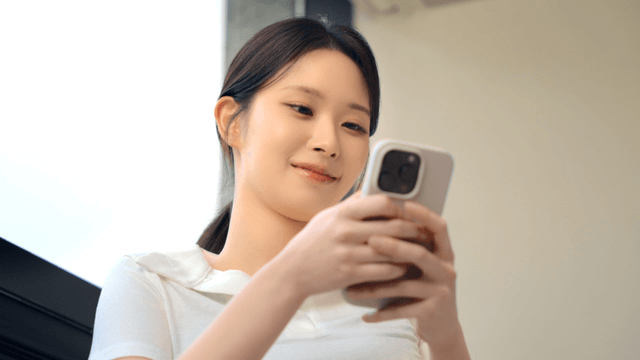 Woman using a smartphone indoors