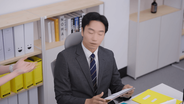 A female employee reporting to her manager