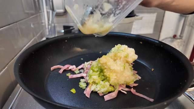 Ingredients being added to a frying pan
