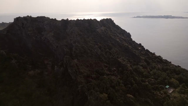 A scenic mountain view by the sea
