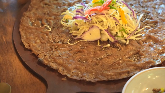 Korean pancake with colorful salad