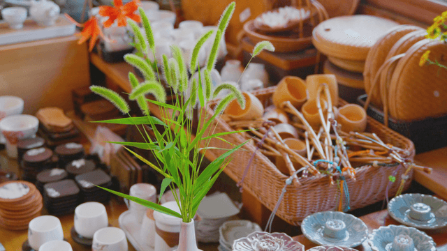 Display shelf with handicrafts and plants